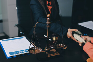 Consultation and conference of professional businesswoman and Male lawyers working and discussion having at law firm in office. Concepts of law, Judge gavel with scales of justice