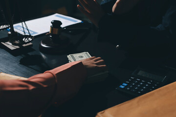 Consultation and conference of professional businesswoman and Male lawyers working and discussion having at law firm in office. Concepts of law, Judge gavel with scales of justice