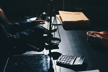 Consultation and conference of professional businesswoman and Male lawyers working and discussion having at law firm in office. Concepts of law, Judge gavel with scales of justice