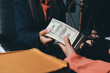 Consultation and conference of professional businesswoman and Male lawyers working and discussion having at law firm in office. Concepts of law, Judge gavel with scales of justice