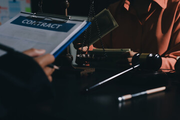 Consultation and conference of professional businesswoman and Male lawyers working and discussion having at law firm in office. Concepts of law, Judge gavel with scales of justice