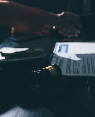 Consultation and conference of professional businesswoman and Male lawyers working and discussion having at law firm in office. Concepts of law, Judge gavel with scales of justice