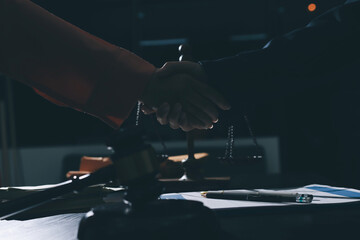 Consultation and conference of professional businesswoman and Male lawyers working and discussion having at law firm in office. Concepts of law, Judge gavel with scales of justice