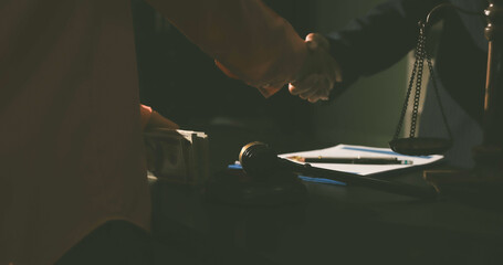 Consultation and conference of professional businesswoman and Male lawyers working and discussion having at law firm in office. Concepts of law, Judge gavel with scales of justice