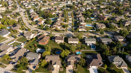 Drone shot of suburban residential street and houses