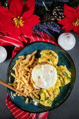 Fried eggs with boiled potatoes and yellow string beans.