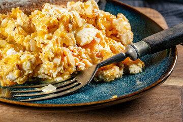 Scrambled eggs with onion.