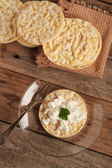 Corn and Fresh Cheese Pancakes Served on a Plate With a Fork