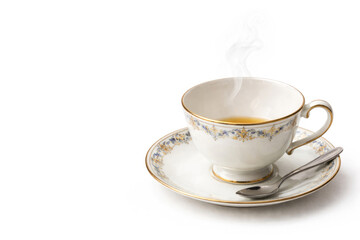 Tea cup with saucer and steam. Space for text.