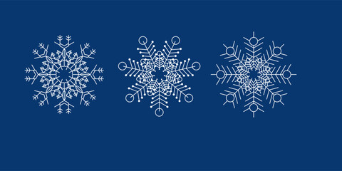 Vector set of 3 white Christmas paper cut 3d snowflakes with shadow on dark blue background. New year design elements