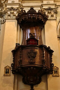 Wooden church ambo, pulpit in a Catholic church in Italy