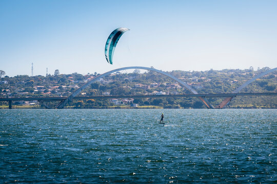 Kite Surfer at Lago Paranoa in front of JK Bridge in Brasilia, Brazil