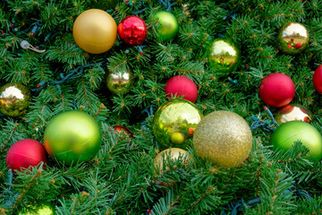 Christmas ornaments on a tree closeup