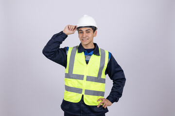 Professional engineer in hard hat looking at camera