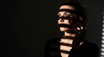 Dramatic Portrait of a Woman with Shadow Stripes and Intense Gaze.