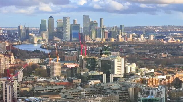 Beautiful panorama of London at sunset, view from the 40th floor include Canary Wharf on distance