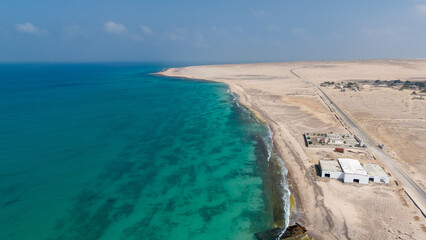 Aerial View of Coastal Desert and Turquoise Sea