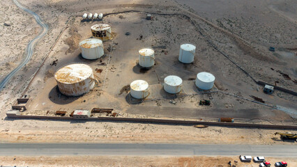 Aerial View of Abandoned Storage Tanks in Desert