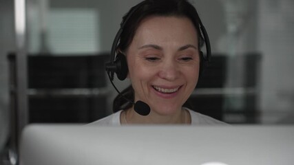 Customer service representative providing assistance, communicating with clients, offering online support, and using virtual communication tools from a modern workspace. Business people concept