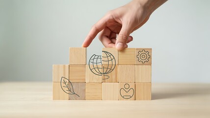 Sustainable Development Foundations: Hand Completing Concept with Blank Wooden Block