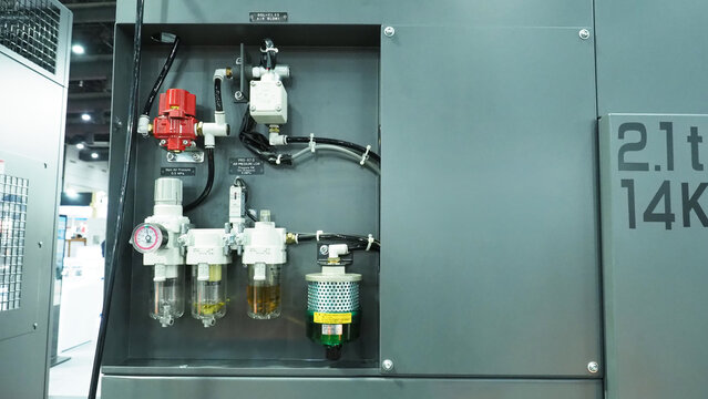 an industrial pneumatic control panel mounted inside a machine enclosure.