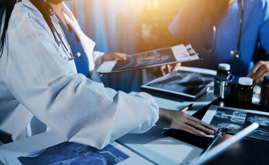 Doctors are meeting at the hospital to discuss treatment options and share experiences with colleagues.