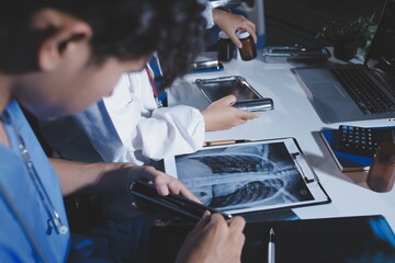 Doctors are meeting at the hospital to discuss treatment options and share experiences with colleagues.