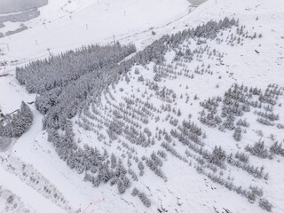 Odemis valley village and fields under winter snow