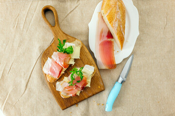 Enjoying fresh sandwiches with ham and cheese