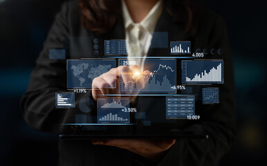 A business professional interacts with dynamic digital data visuals on a tablet, showcasing analytics and insights in a modern office setting, reflecting technology role in decision-making. Scalp