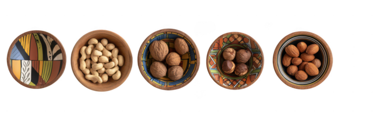 set of wooden bowls with various nuts isolated on a white background