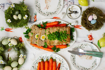 Easter meatloaf with egg, carrots, green beans .top veiw