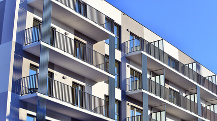 Luxury house complex of flats in condo area . Part of city real estate property, condo architecture on a sunny day no people.