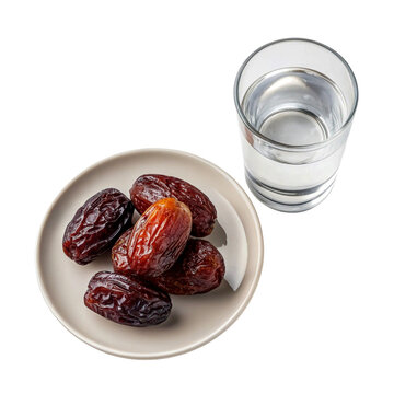 Plate of dates with glass of water