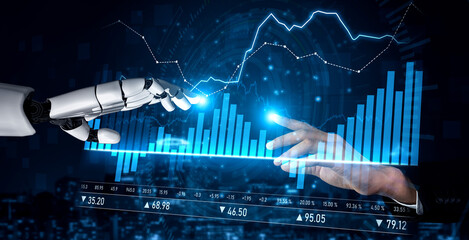 Futuristic robotic hand reaching toward human hand with digital stock market data and glowing graphs in a technology-driven financial environment Scalp.