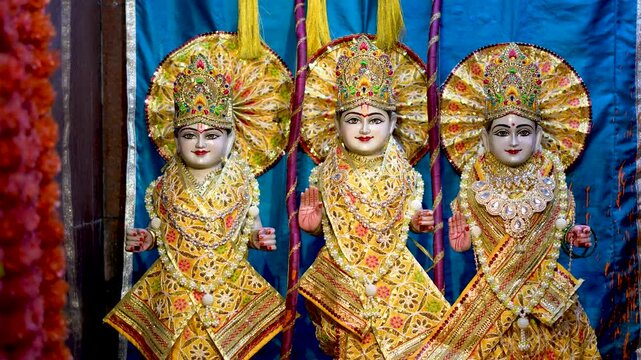 Lord Ram, Sita and Laxman Wearing Yellow Attire Depicting Hindu Divine Family