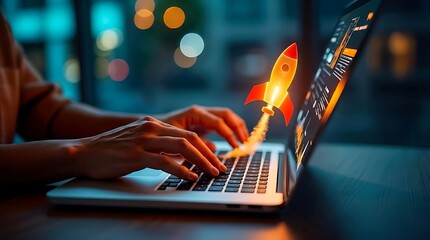 Hands typing on laptop with rocket launching from screen, representing startup growth and innovation, digital technology concept