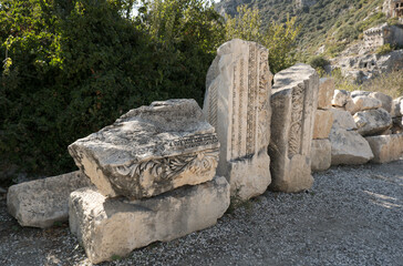 Ancient Ornate Stone Columns and Architectural Fragments in Demre, Turkey, Reflecting Lycian Craftsmanship