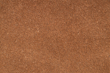 Brown suede leather texture macro background