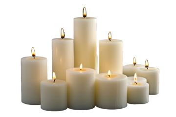 single burning white candles with medium size isolated on black background