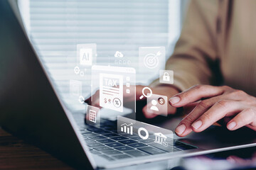 Calculation tax return and VAT concept, Business woman using laptop for calculates fill out personal income to pay taxes return form online for tax payment, interest rate with tax and percentage