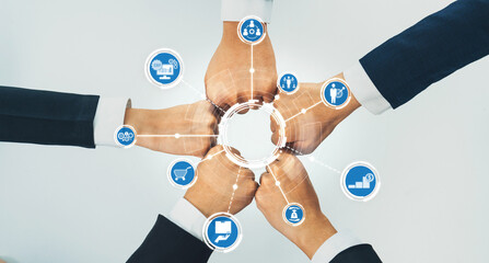Office worker team stacking hand together symbolize successful group of business partnership and strong collective unity teamwork in community workplace in panoramic banner. Shrewd Amity