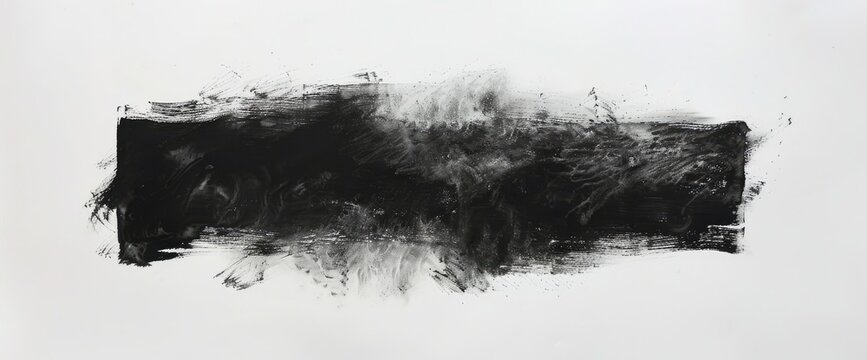 A long, dark, horizontal smear of charcoal with brushstrokes on a white background