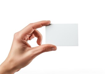 Obraz premium A person's hand holding a blank rectangular card, isolated on white