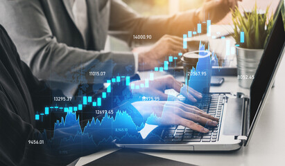 A professional team collaborates on financial analysis using a laptop, with overlay graphics depicting growth trends and market performance in an office setting. Scalp
