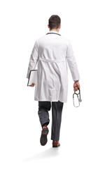 Rear view of a male doctor walking away and olding a stethoscope and clipboard