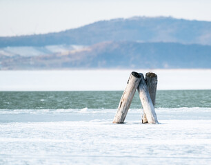 half frozen lake with water and ice