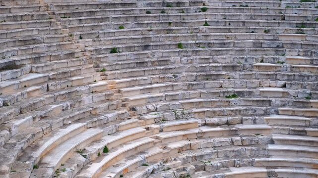 Steps of the ancient amphitheater. Stone steps and seating areas of ancient roman theatre create a captivating scene, showcasing the grandeur of this historical landmark