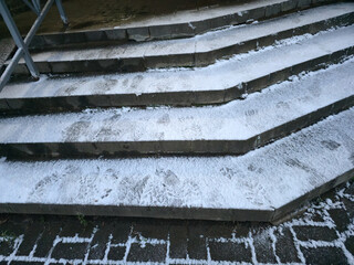 The staircases are icy and frozen under a layer of snow