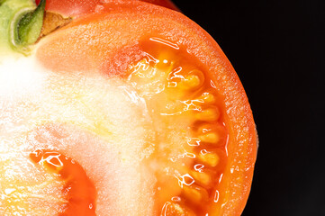 Juicy Tomato Slice Macro on Black